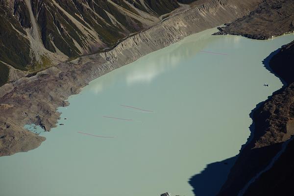 Lines in the Tasman Glacier terminal lake demonstrate the extent of its retreat in recent years. 